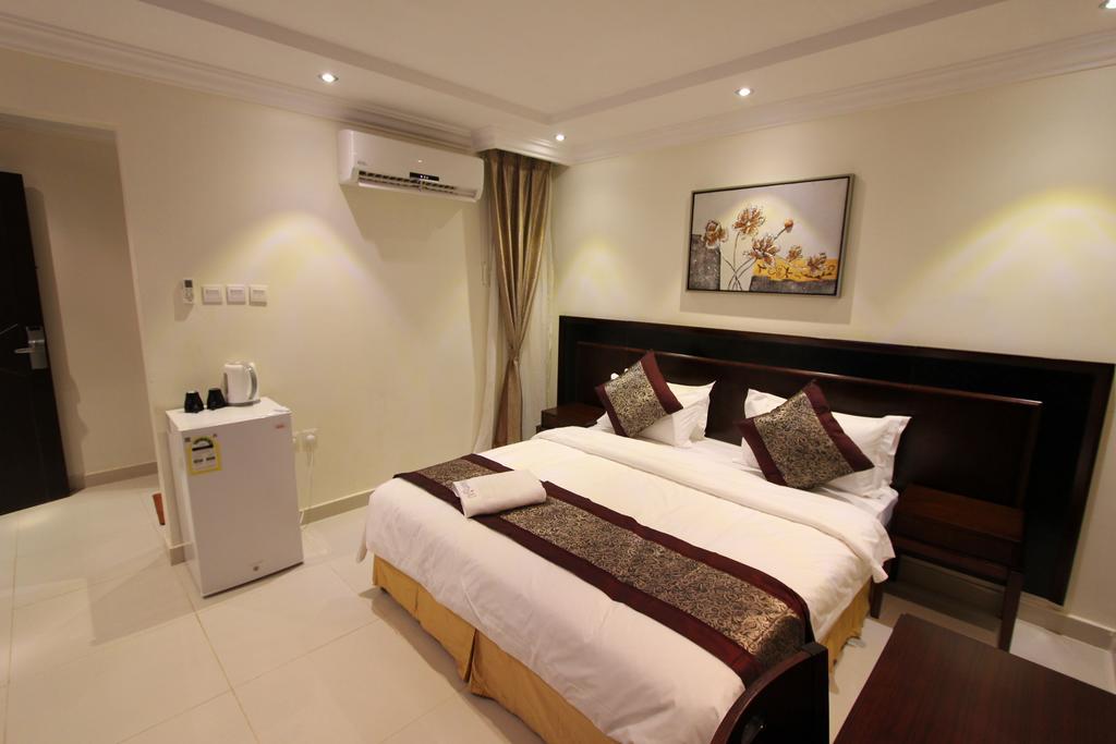 Taleen Alaqiq Hotel Apartments Рияд Стая снимка