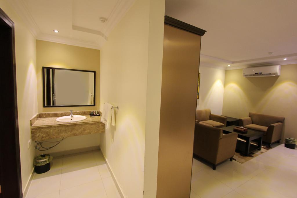 Taleen Alaqiq Hotel Apartments Рияд Стая снимка