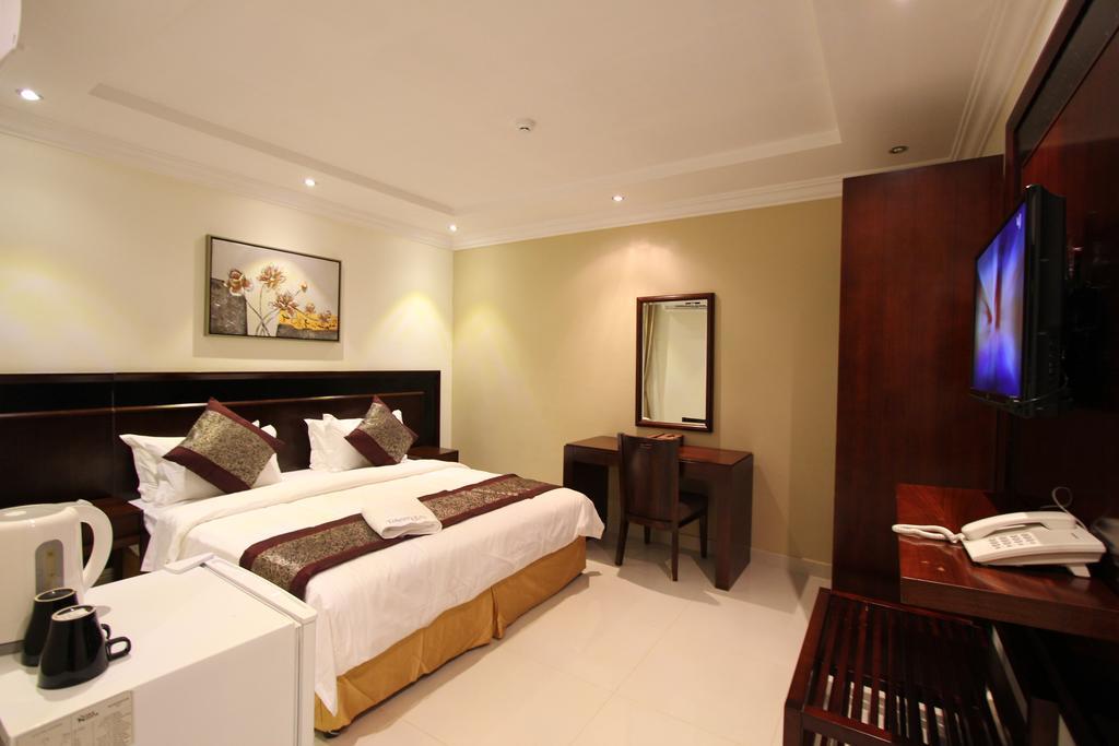 Taleen Alaqiq Hotel Apartments Рияд Стая снимка